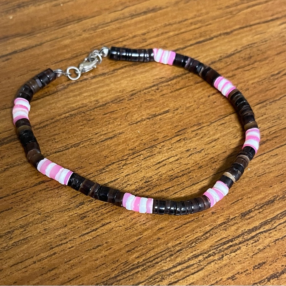 2 bracelets- Brown, pink and white Puka shell, and a pink Puka shell
